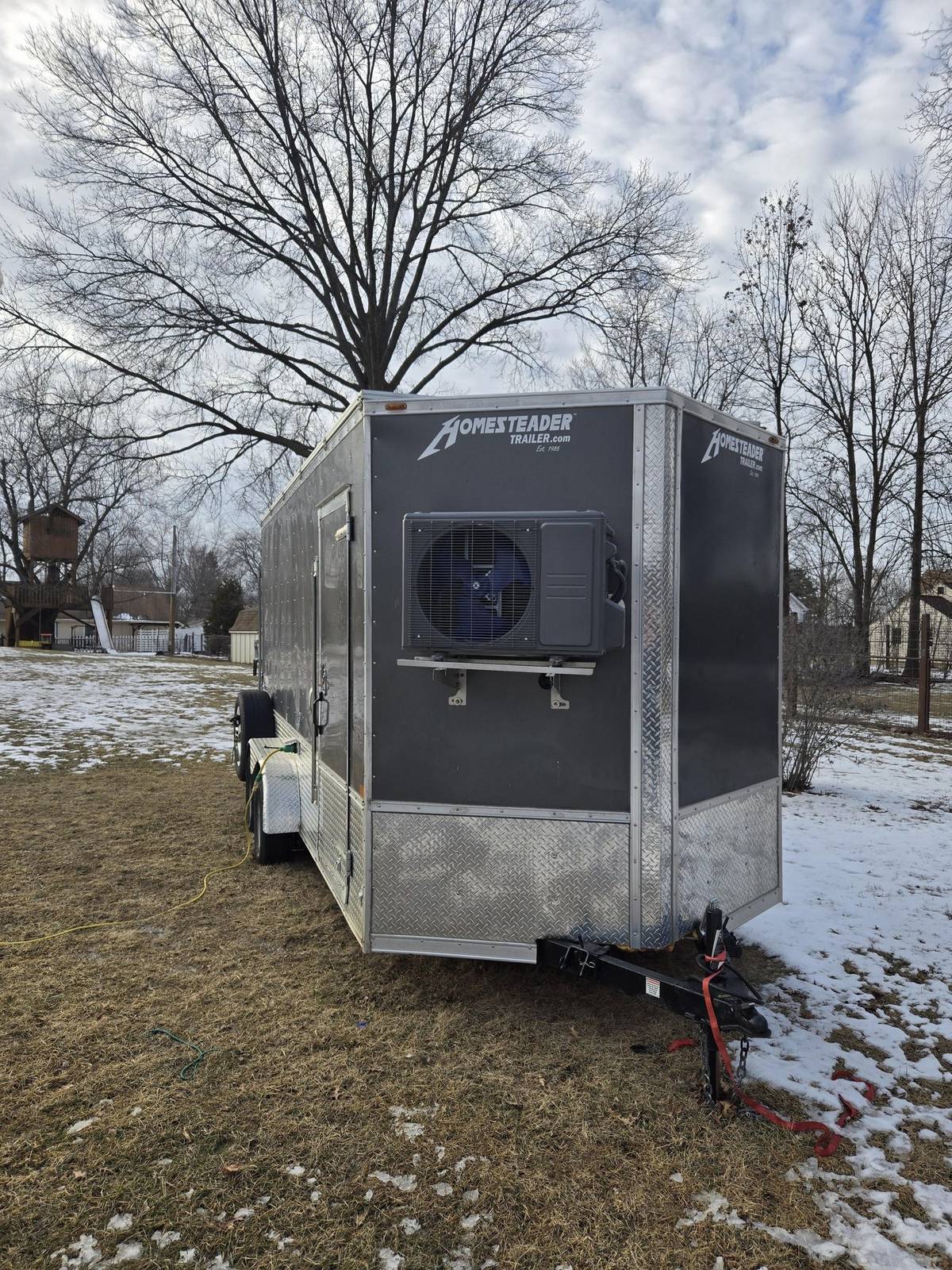 Cargo trailer conversion with a compact mini-split mounted on the front